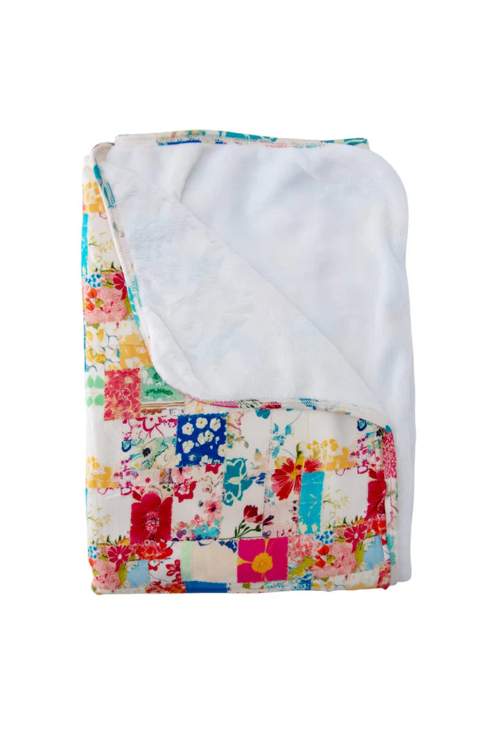 Patchy Bloom Swaddle Blanket