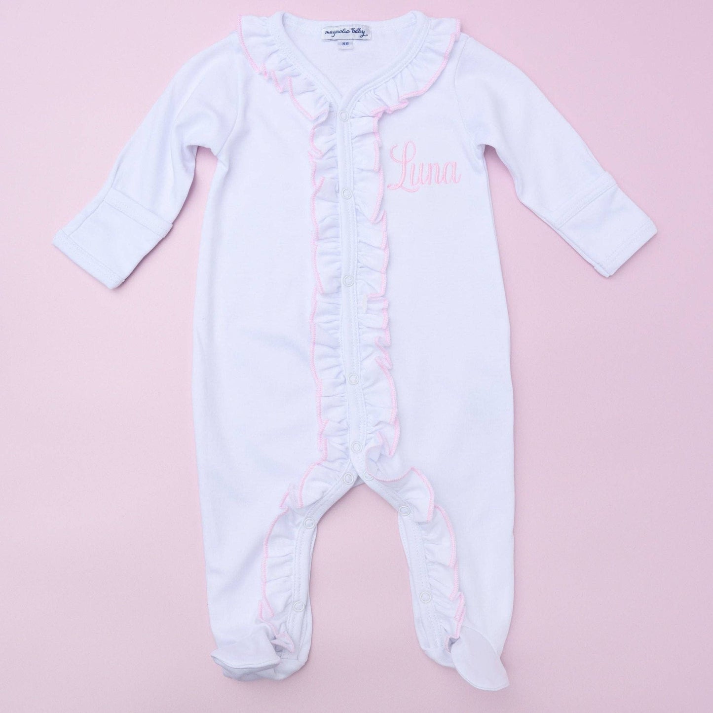 Magnolia Baby White Ruffle Footie with Pink Trim