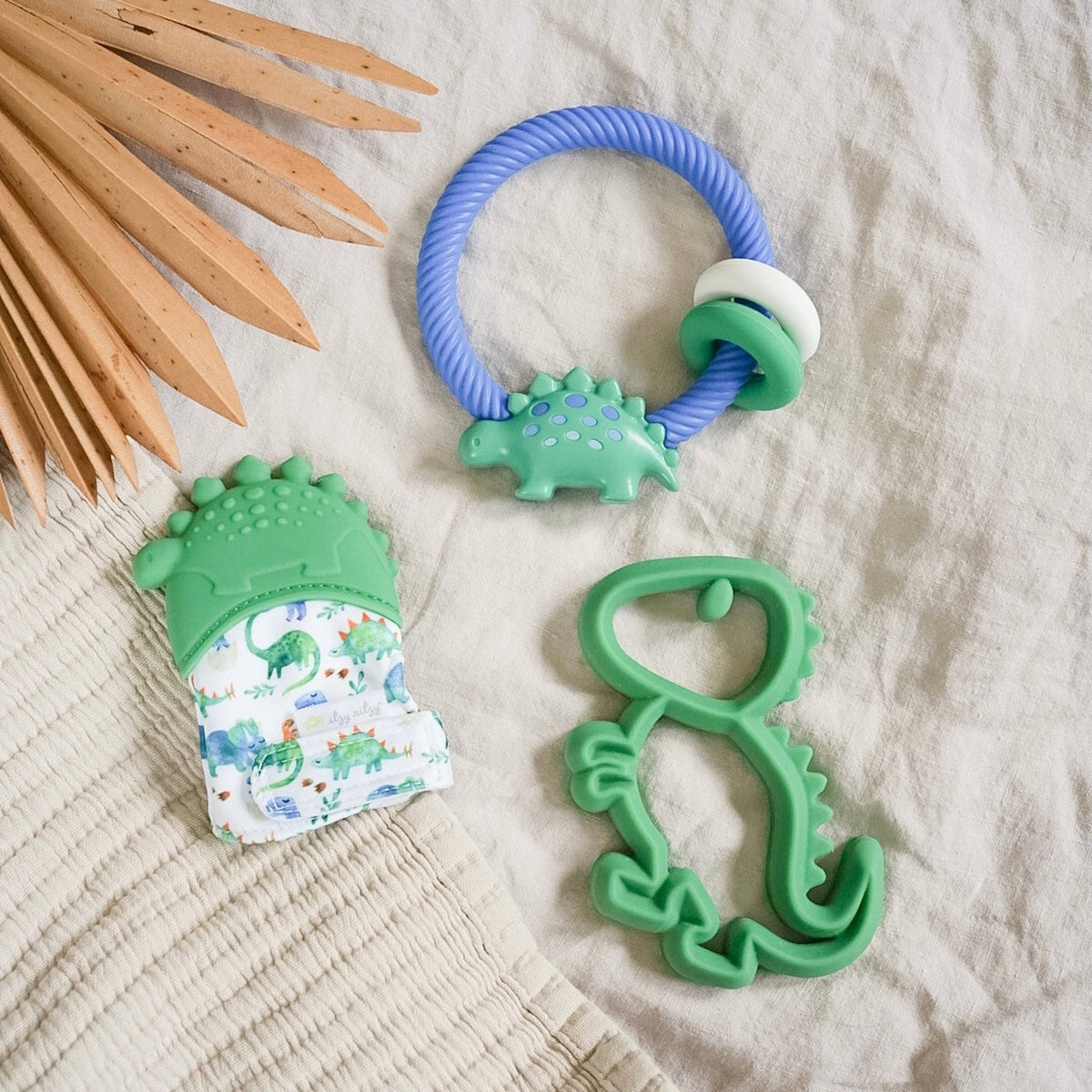 Itzy Mitt™ Silicone Teething Mitts: Highland Cow