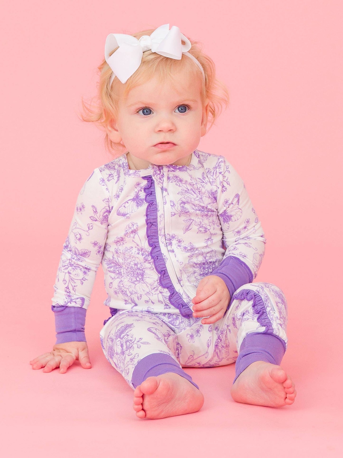 SoftSnooze™ Baby Girls Bamboo Viscose Wisteria Purple Butterfly Garden Toile Convertible Ruffle One Piece Footie Pajama: Purple / Newborn