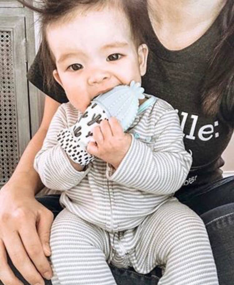 Itzy Mitt™ Silicone Teething Mitts: Highland Cow